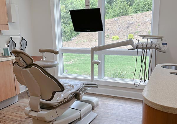 our dentist working in an operatory